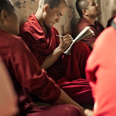 tibetan_monk_studying_in_school_web